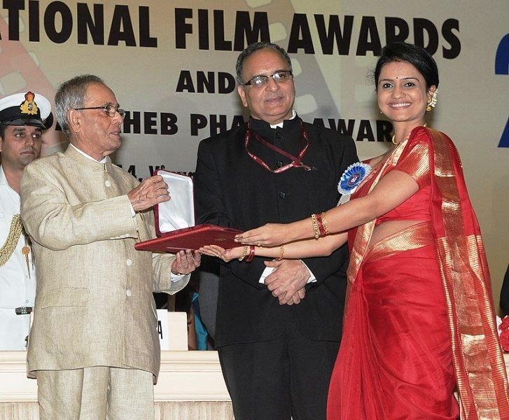 Amruta Subhash Receiving Award