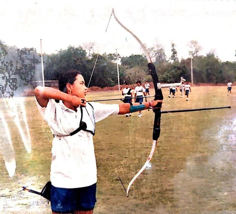   Lin Laishram kao mladić trenira streličarstvo