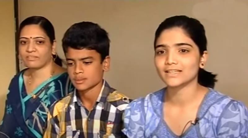 14-aastane Digvijay Deshmukh koos ema ja vanema õega