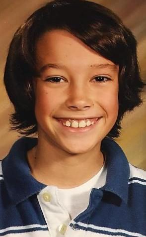 Jameso Charleso nuotrauka, kai jam buvo 9 metai