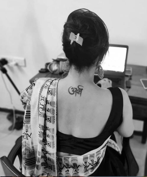 Tatuaje en la espalda de Swati Kumari