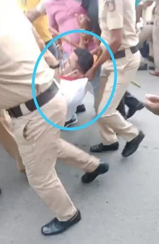   Rupesh Rajanna being arrested by police