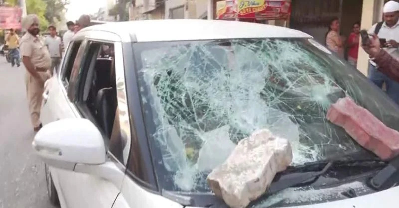   Tertuduh Sandeep Singh's car after the attack at the crime spot