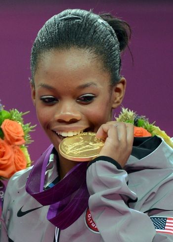 Gabby Douglasas įkando aukso medalį