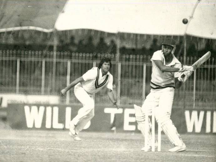   Mohinder Amarnath hekter Pakistan's Imran Khan to the fence during the fourth Test match versus Pakistan at the Niaz Stadium, Sind, Pakistan in January 1983